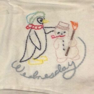 Handcrafted snowman flower sack Wednesday towel